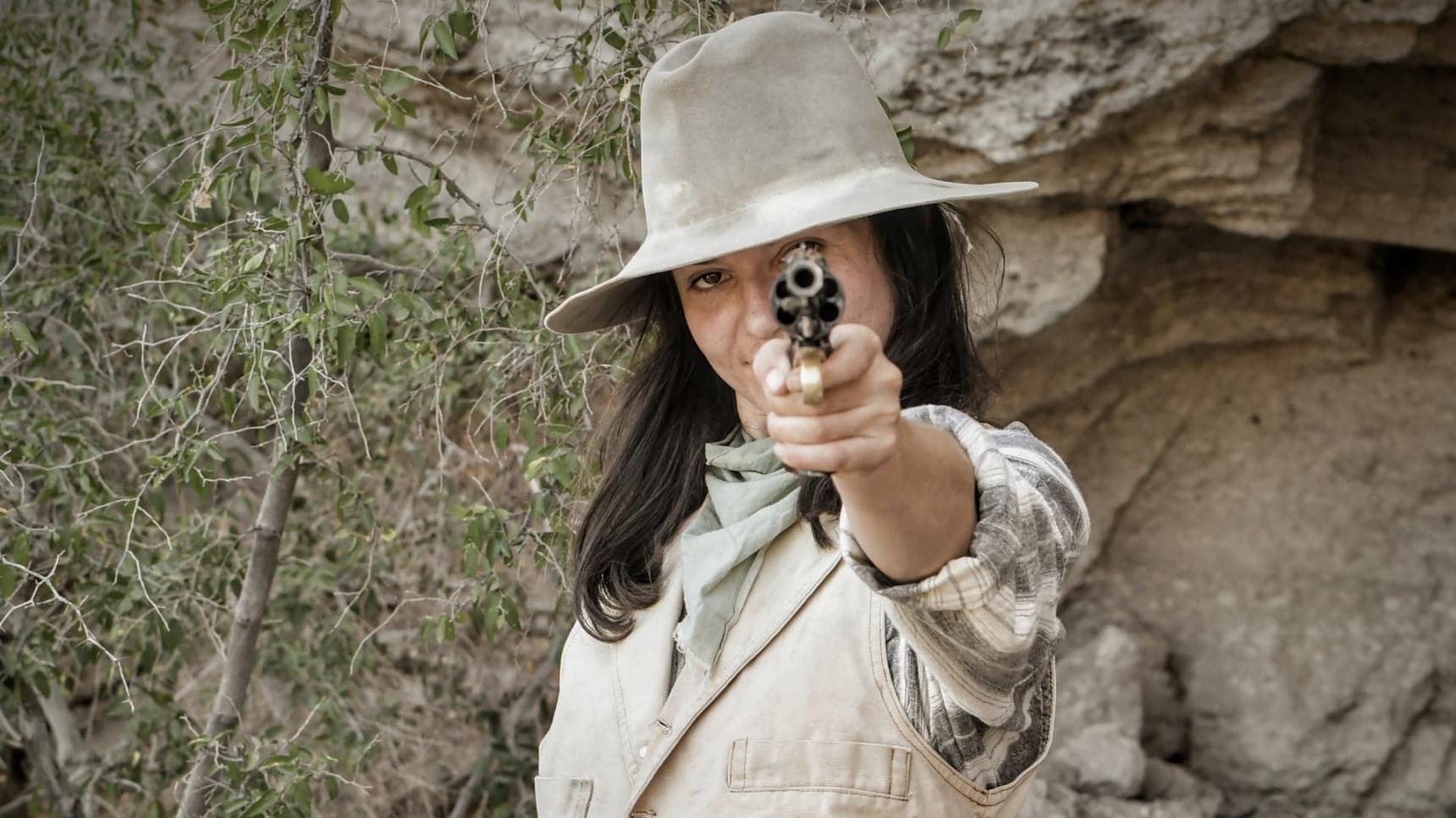 Fondo de pantalla de la película The Woman Who Robbed the Stagecoach en Cuevana 3 gratis