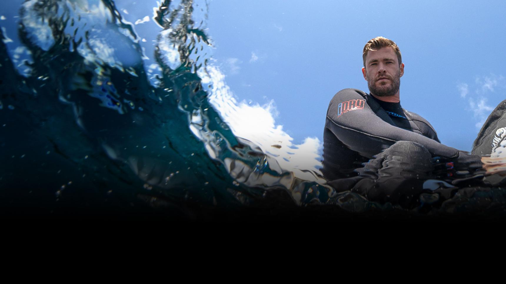 Fondo de pantalla de la película Chris Hemsworth: La playa de los tiburones en Cuevana 3 gratis